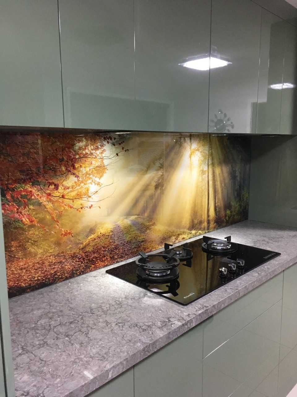 Kitchen with custom glass splashback of a forest, road and sunrays.