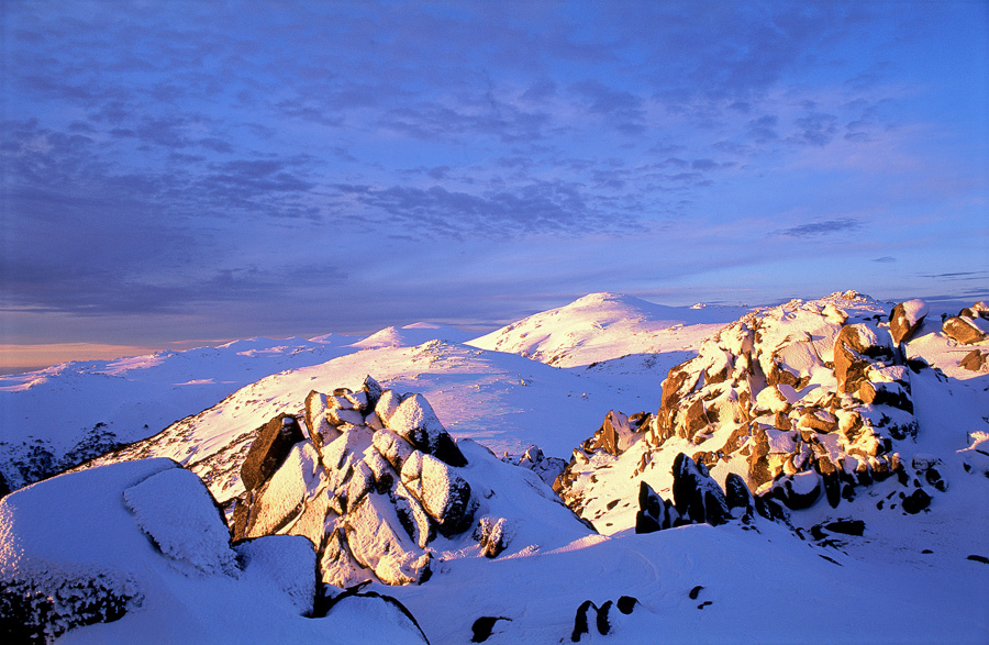 Photograph of a snow capped mountain range