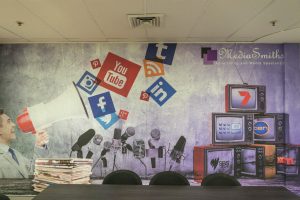 Digitally printed removable self-adhesive wall fabric on an office wall