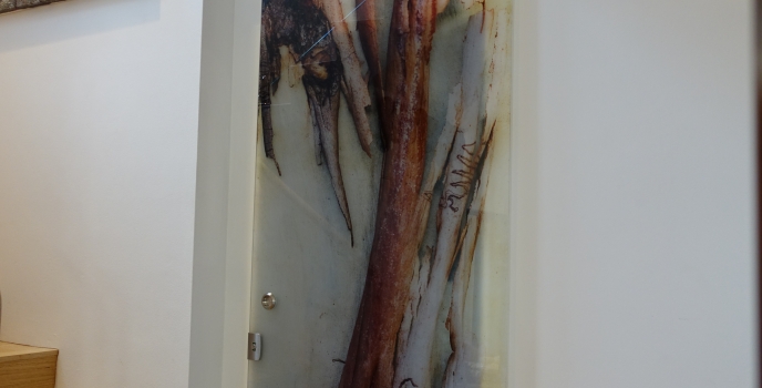 Laminated graphics for sliding doors