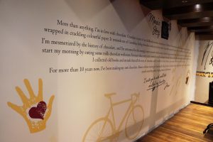 Shop interior graphic wall custom digitally printed artworks printed on self-adhesive vinyl and over laminated 